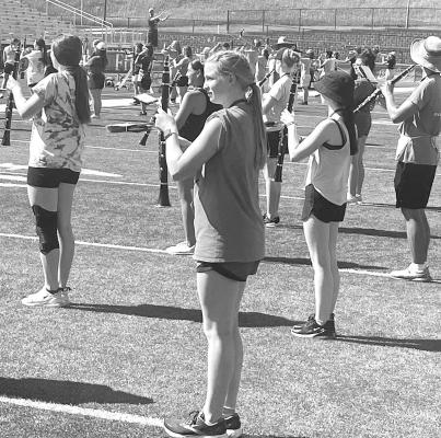 CHS student Joslyn Reiff, above center, participated in the Masonic All-Star Marching Band which performed during the 65th annual Shrine Bowl game on June 3 at UNK. (Courtesy photo))