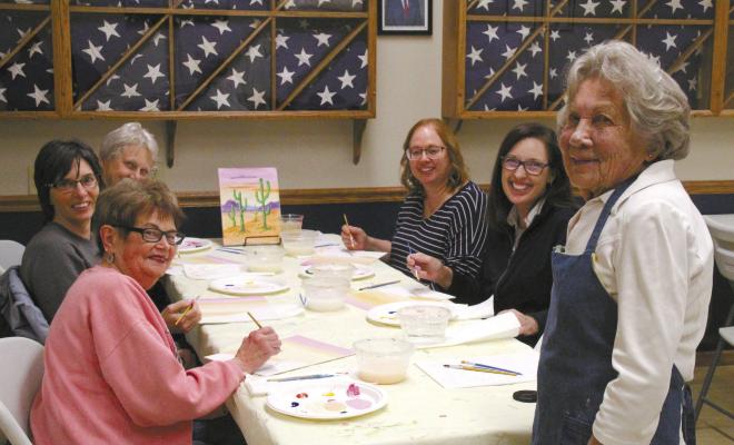 From left, Shari Sheppard, Lanette Conroy, Tami Smith, Carla Kimball and Shelly Griffith paint under the instruction of local artist Mariel Klingbeil. (Courier photo by Ellen Mortensen)