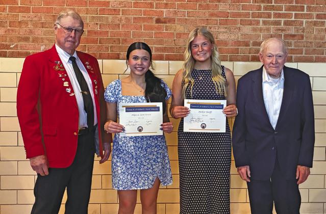 From left: Elks member Gary Wright was one of the presenters of the Neuman M. &amp; Mildred E. Harris Scholarship to Alyssa Lawrence of Ord, and Neltje Reiff of Callaway, along with fellow presenter Bill Shirkey.