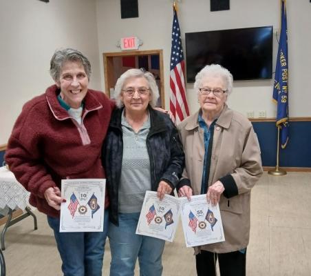 Three Callaway Legion Auxiliary members were honored for contiinuous membership to the organiza- tion at the American Legion Birthday party on March 10. From left are Carol Harrison - 10 years, Janet  Schaad - 10 years, and Marjorie Frederick - 55 years. (Photo courtesy Jo Chesley)