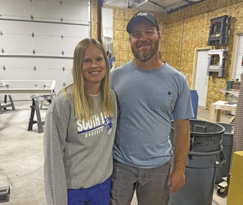 Bryson Kennedy and his wife, Traci, were joined by friends and family for a ribbon- cutting ceremony on the