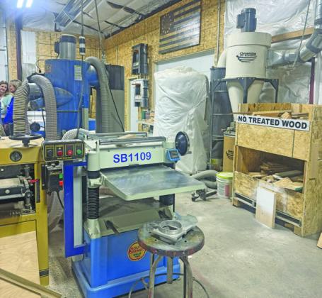 Kennedy Construction and Woodworks uses stateof- the-art equipment to design a wide variety of items - from cabinets to signs - out of wood or metal. (Photo courtesy Kelsey Wyckoff)