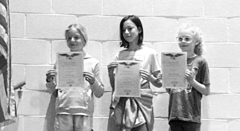 Americanism Essay contest winners for 4th grade were, from left: 1st Olivia Doggett, 2nd Fayth Duckett and 3rd Brianna Quitmeyer.
