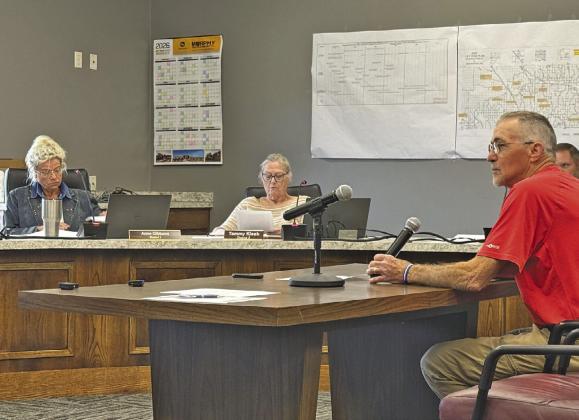 Pictured far right is Custer County Recycling Center Manager Kelly Flynn addressing the Board of Supervisors during a June 23 meeting. The board ultimately voted 4-2 to keep the center open for at least the next year and a half. (Photo courtesy Jeremy Shipe KCNI/KBBN)