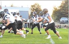 The Bobcat offense was in full swing Friday as #3 senior quarterback Trey Connell hands off to #20 junior AJ Starr.