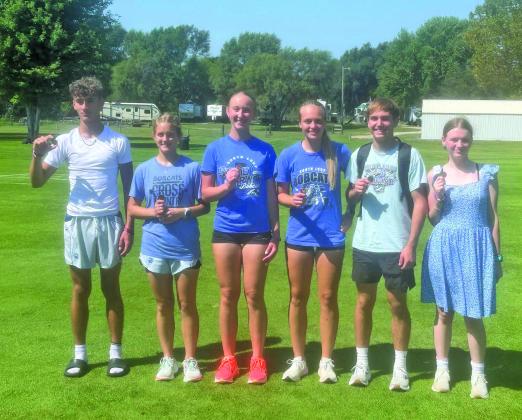 Members of the South Loup cross country team include, from left: Dagen Fletcher, Chloe Coleman, Delanie Weinman, Jade Bierman, Walter Bierman, and Danielle Burd. The ladies team, which also includes Lyla Bierman, Lia Russell, and Tasia Trotter, finished as runners-up in the team standings at Saturday’s meet in Cozad. (Photo courtesy CPS)