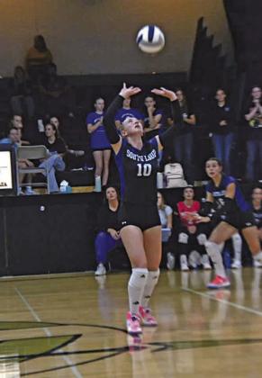 Rae Hagler positions herself under the ball to get a good set to her hitter last week as the Lady Bobcats played Ansley/Litchfield.