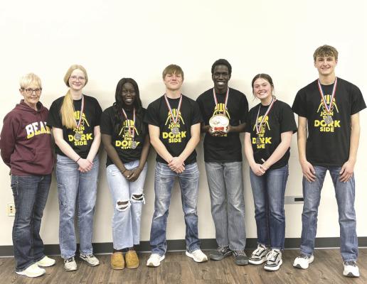 The Callaway Quiz Bowl team has qualified for the state meet next week in Hastings with team members, from left: Coach Cathy Leibhart, Chenney Dishman, Nyachay Haidle, Dawson Mason, Uotong Haidle, Addison Bailey, and Dylan Pandorf. (Photo by Brandy Mason)