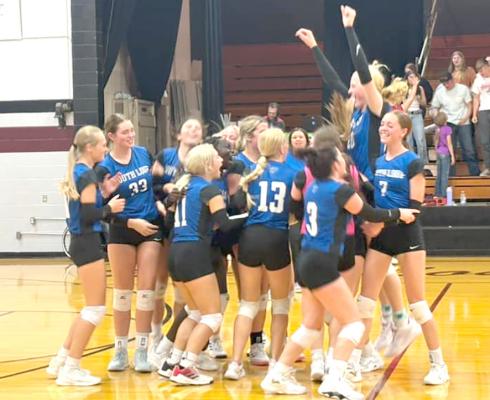 The South Loup volleyball team picked up their first win of the season last week, and a celebration ensued. (Photo courtesy CPS)