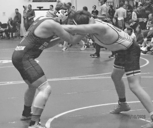 Blake Robertson tries to gain an advantage over Jason Bobo from North Platte at SEM.
