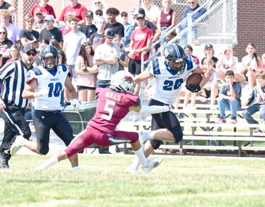 South Loup's AJ Starr breaks a tackle for extra yardage during the Sept. 6 game at Hi-Line. The Bobcats picked up their second win of the season.