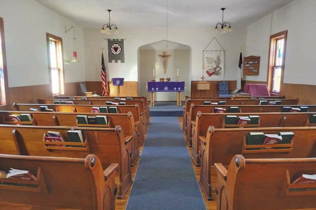 Only the furnishings have changed in the interior of the nearly century-old Callaway Lutheran Church. The historic building has been serving the community in its present location for the past 50 years. (Courtesy
