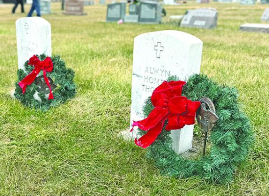 The American Legion Auxiliary decorates the graves of veterans at local cemeteries with Christmas wreaths each season. This year approximately 210 wreaths were laid at Rose Hill Cemetery by 20 volunteers. (Photo courtesy Jo Chesley)