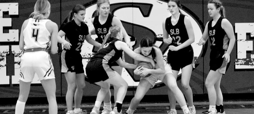 Josie Reiff fights for the ball during Saturday's game between South Loup and Southern Valley. (Courier photos by Patti Schwarz)