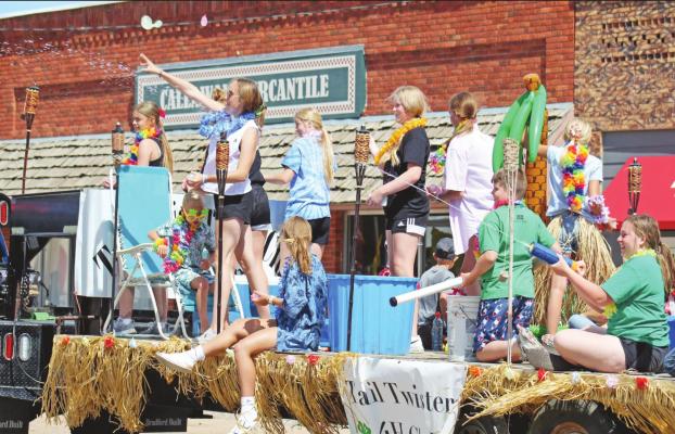 Tail Twisters 4-H Club had the winning entry in the Pioneer Picnic parade in Callaway on Saturday, June 24. Clearly the members riding on the float were having a good time! Courier photo by Ellen Mortensen
