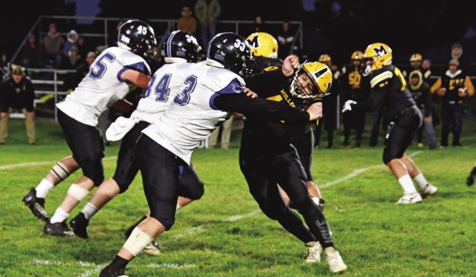 Courier photos by Loleta Connell ABOVE: Joey Sallach wins the match up against #40 James Kessler in the Bobcat's sound win 64-14 at Mullen. Also pictured #34 Clay Witthuhn and #45 Rio Remund LEFT: Sophomore Harper Johnson hunts down the Bronco ball carrier in Mullen Friday evening for a Bobcat win. BELOW: Earning valuable minutes in the Bobcats 64-14 victory over the Mullen Broncos are #50 Kyle Bloomer, #64 Hayden Stretesky, #24 Lance Wooters, #14 Kaden Paulsen and #11 Dylan Pandorf
