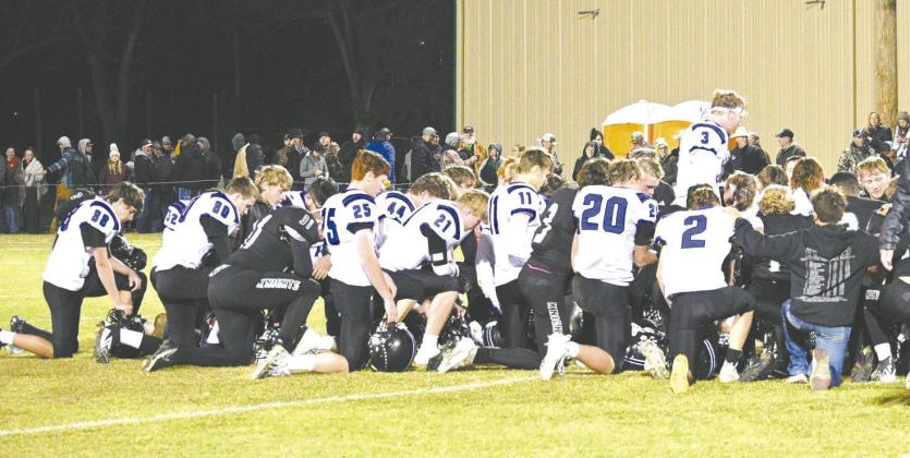 The two teams met on the field at the conclusion of the last game for the Bobcat seniors in a display of gratitude and unity for prayer. South Loup quarterback Trey Connell (#3) led the group.