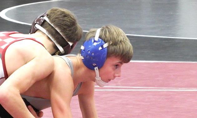 Noah Hiatt, 106 lb. Bobcat wrestler, in a match earlier this season. (Courier photo by Brandy Mason)