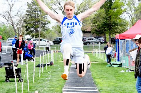 RIGHT: Ethan Furne's leap of 20' 9.5' in the long jump qualifies him for the chance to compete in Omaha.